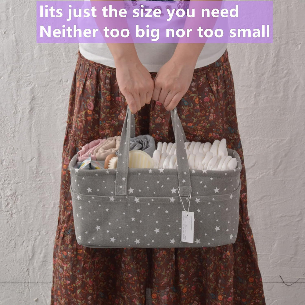 Carrying the star-print diaper caddy by its handles